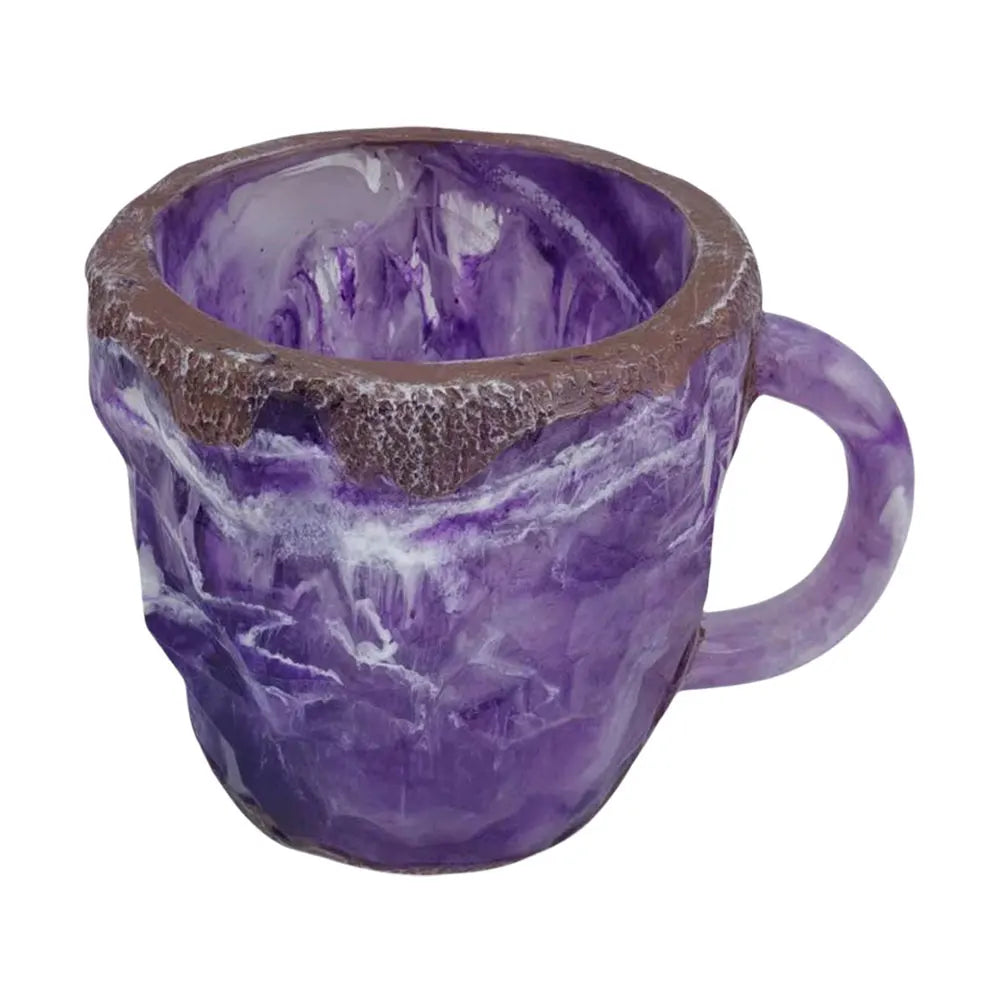 Colorful resin coffee mug with purple tones, featuring a textured brown rim and a comfortable handle.