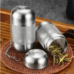 Stainless steel tea infuser with fine mesh design, ideal for brewing loose leaf tea. Durable and reusable for a perfect tea experience.