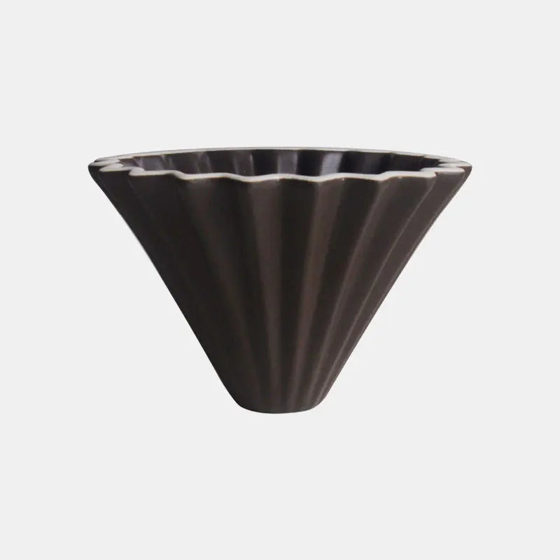 Close-up of the origami-inspired design of the coffee filter cup