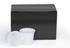 Black box with white coffee pods on a white background
