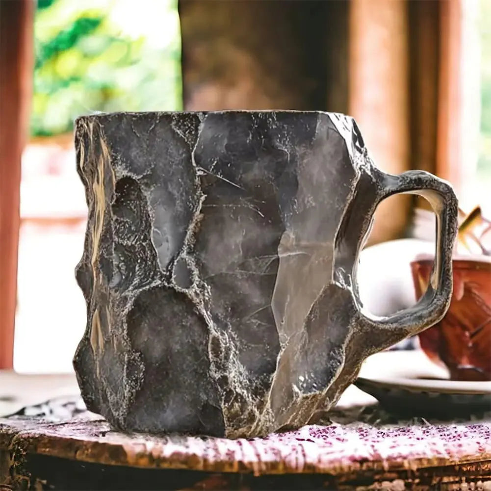 Marble-textured mug on a table with a blurred background