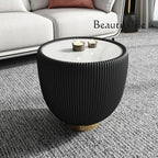 Black ribbed side table with candles on a gray carpet, featuring the brand 'Beautifulife'.