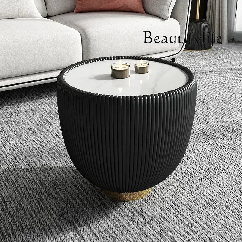 Black ribbed side table with candles on a gray carpet, featuring the brand 'Beautifulife'.