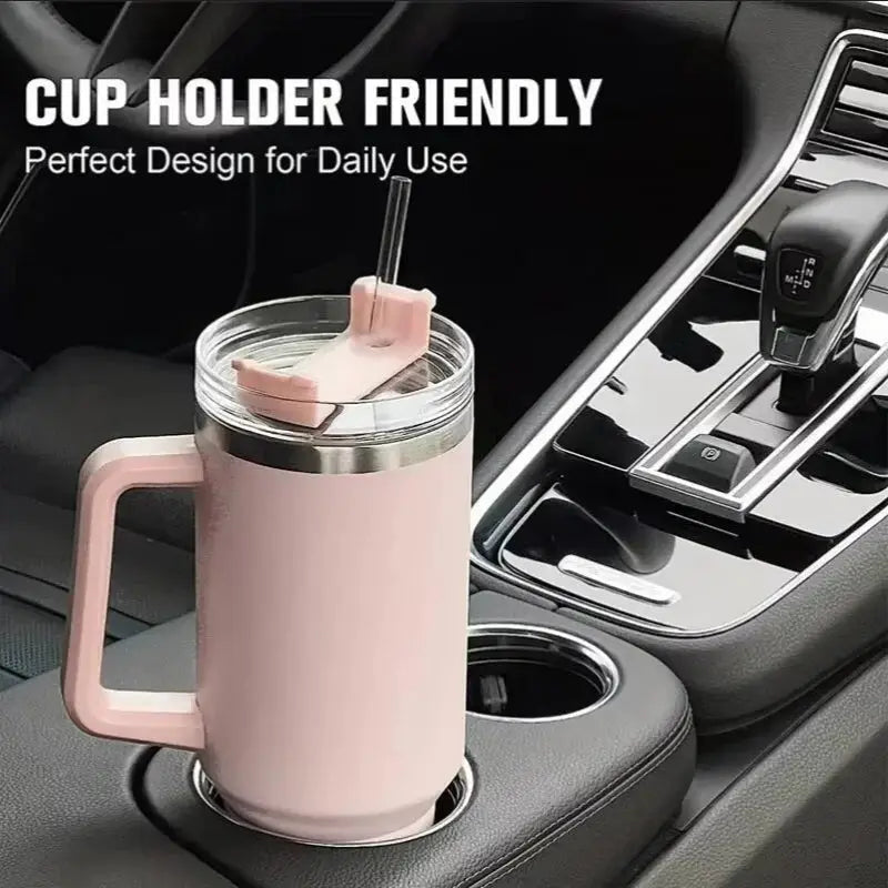 Pink insulated mug with handle and straw in a car cup holder, with text 'Cup Holder Friendly' and 'Perfect Design for Daily Use'.