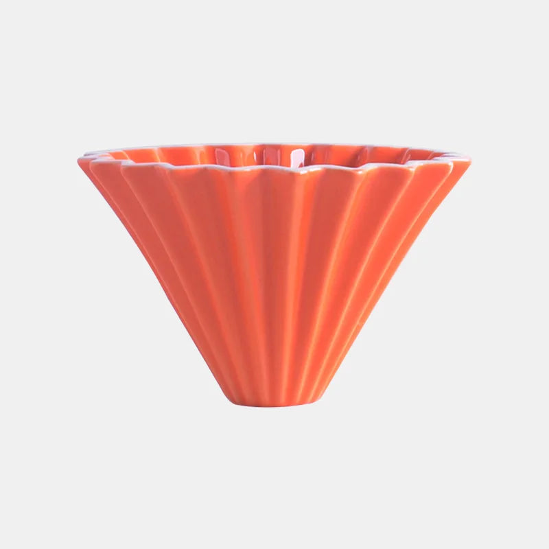 Close-up of the origami-inspired design of the coffee filter cup