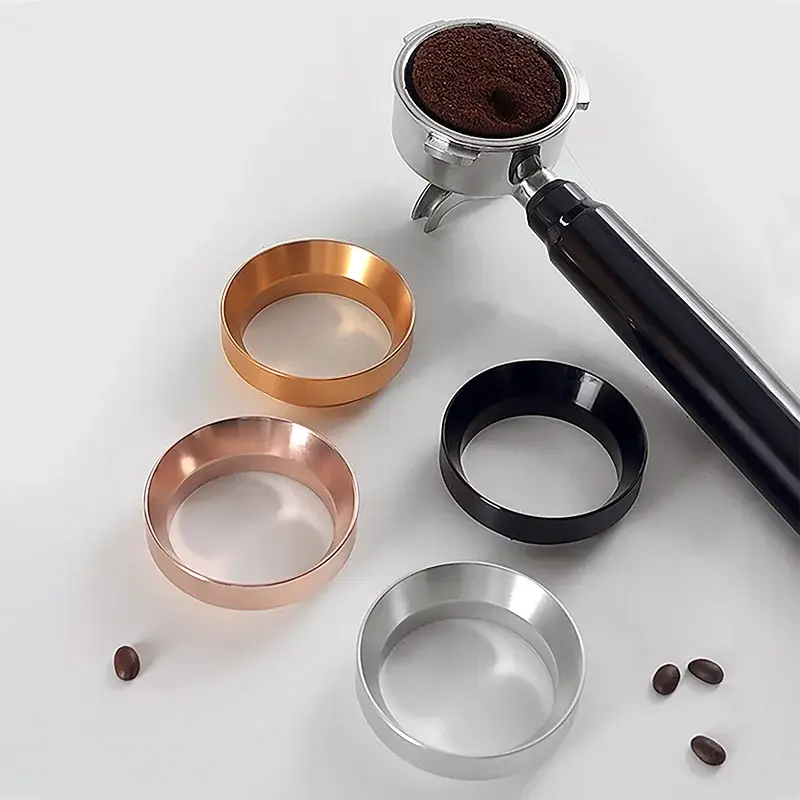 Coffee grinder with bronze and black rings on a white background