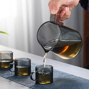 Elegant glass teapot showcasing tea brewing process