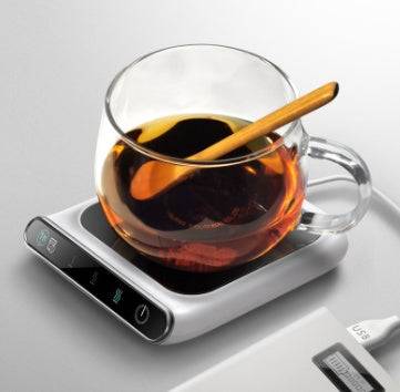 5V mini cup warmer USB coffee heater keeps beverages warm while working. Sleek black design, perfect for home or office use.