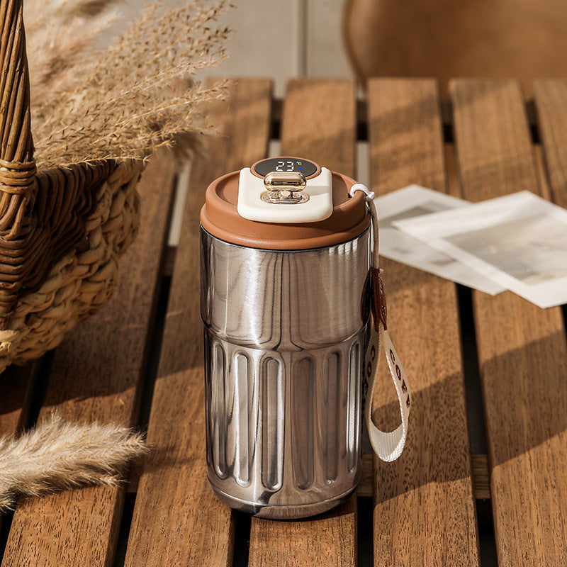 Stainless steel smart digital thermal bottle with brown lid and temperature display, 450ml. Keeps drinks hot or cold with a durable insulated design.