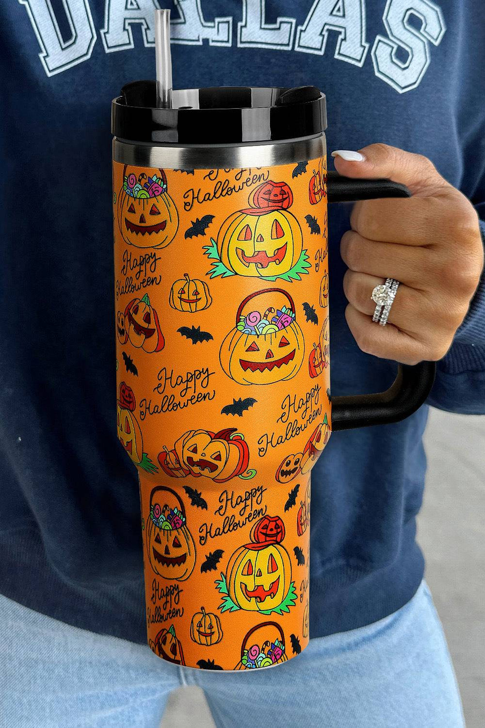 Large 1200ml thermal insulated water cup with straw, featuring a vibrant Halloween pumpkin design. Keeps drinks hot or cold for 24 hours.