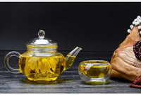 arge capacity glass teapot filled with brewed tea"