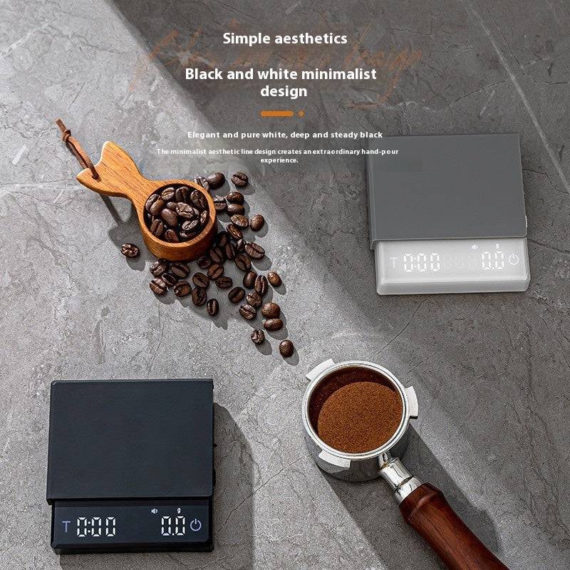 Smart coffee scale with high precision and built-in timer, featuring a sleek black and white minimalist design. Ideal for precise pour-over brewing at home or in cafés.