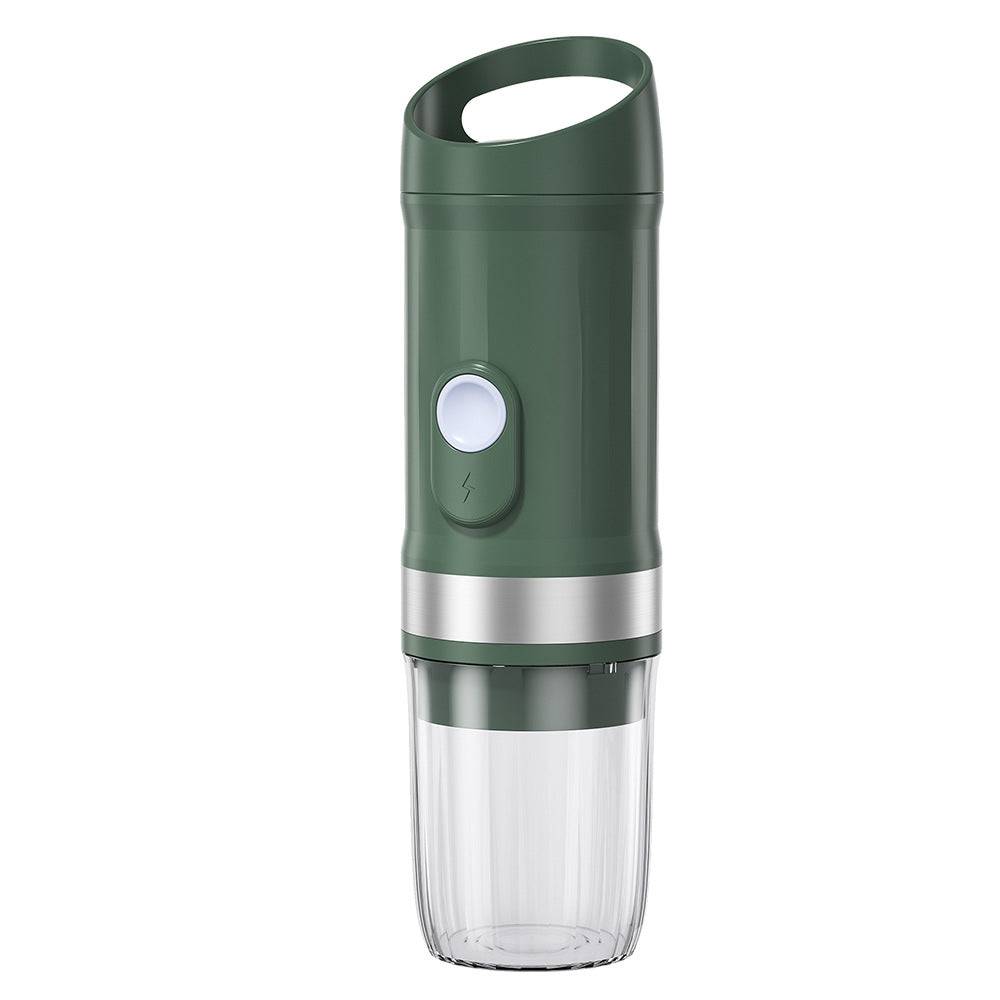 Green portable blender on a white background