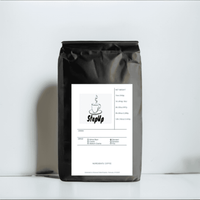 StepUp Fresh Roasted Coffee Beans in a sleek black bag. Premium dark roast blend with rich aroma, perfect for espresso and brewed coffee lovers.