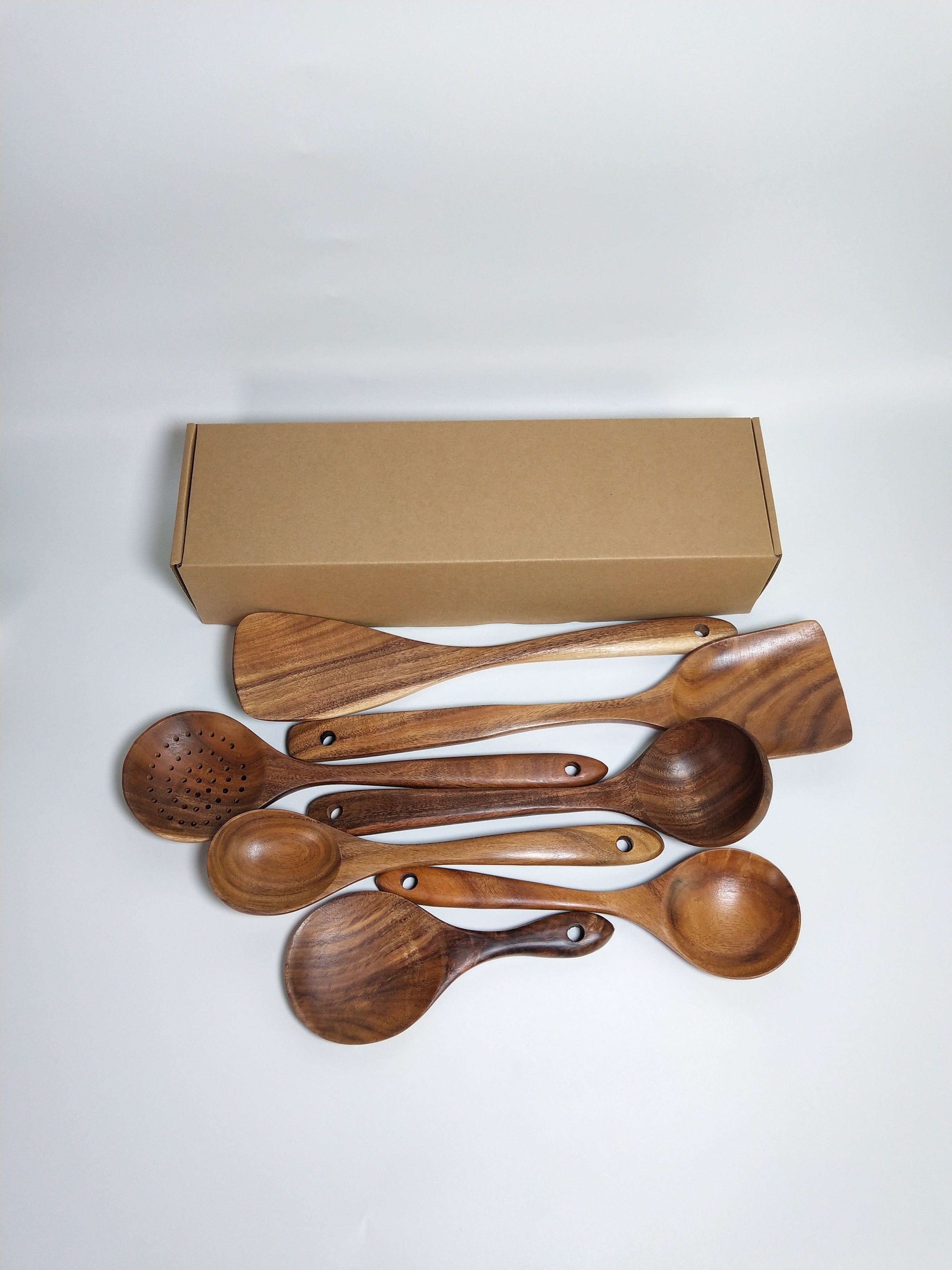 Teak wooden cooking set on a table