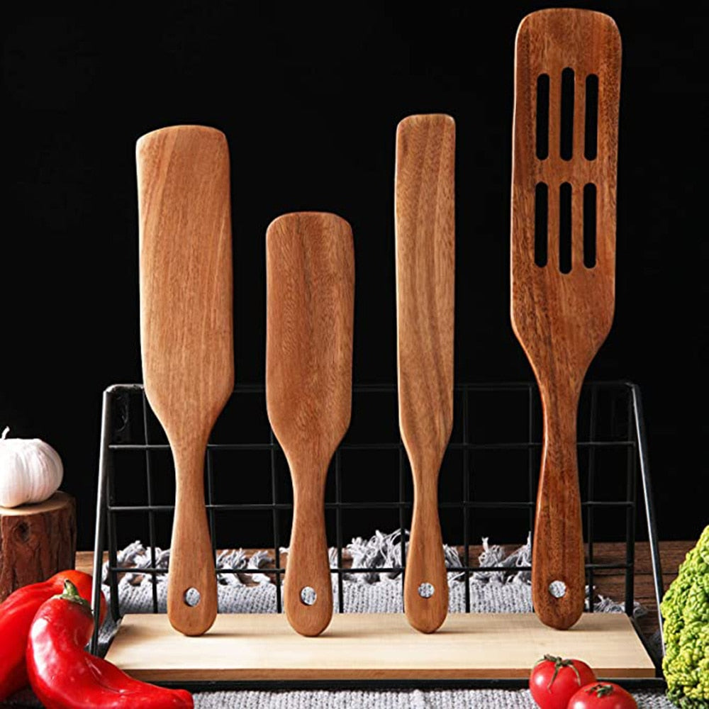 Teak utensils in a utensil holder