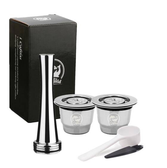 Reusable coffee pods set with stainless steel refillable capsules, tamper, scoop, and brush. Eco-friendly and compatible with Nespresso machines.